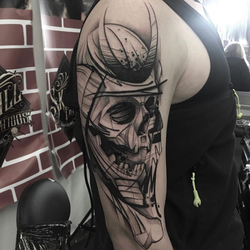 Tattoo Convention Gewinner Tattoo von einem Totenkopf im Sketch Stil auf dem Oberarm Tattoo Convention Gewinner Tattoo von einem Totenkopf im Sketch Stil auf dem Oberarm
